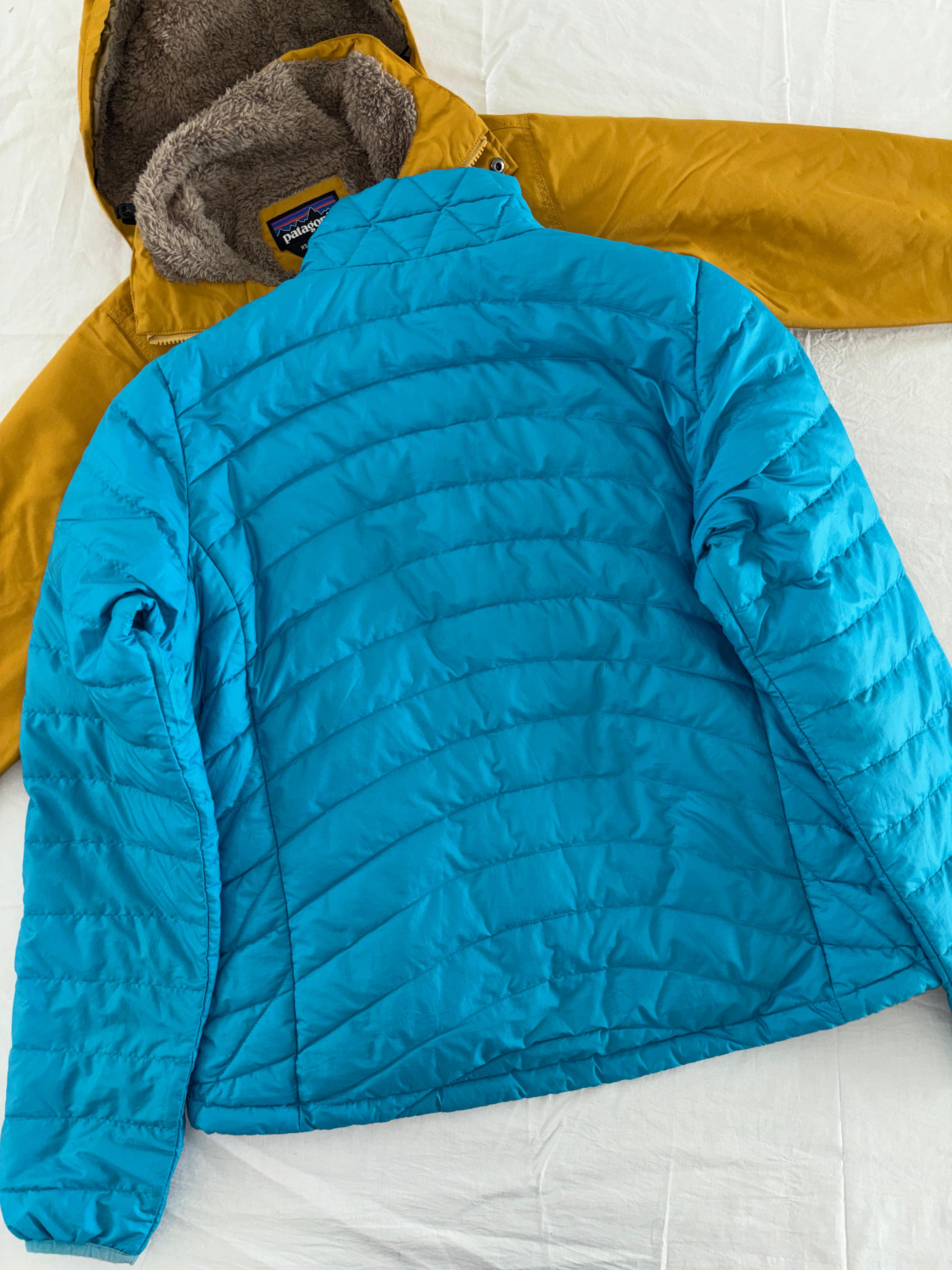 PATAGONIA DE PLUMA DE GANSO. COMPRESIBLE QUE SE HACE BOLSA. CASI COMO NUEVO. XL DE DAMA.