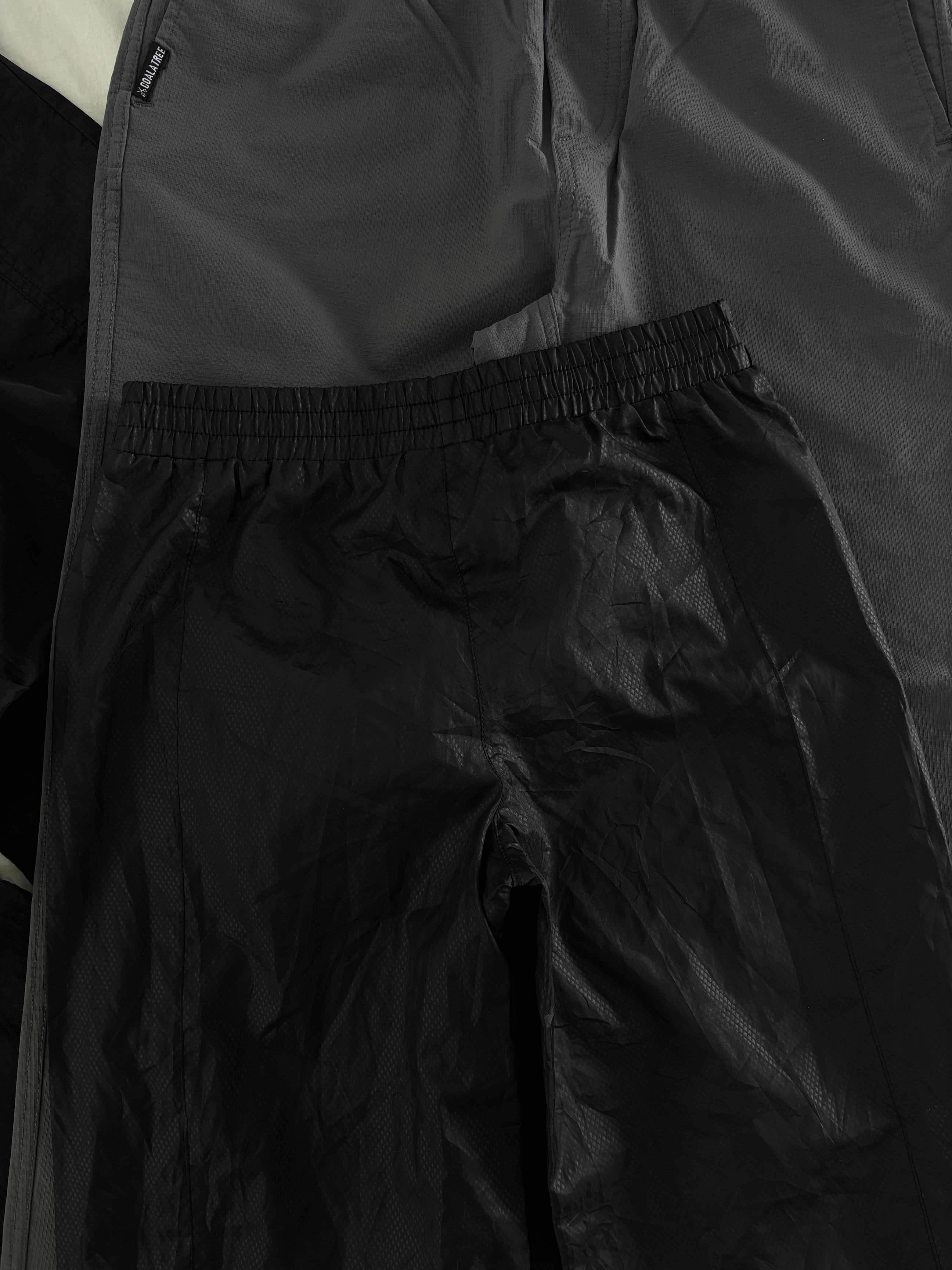 PANTALÓN ROMPEVIENTOS PARA SENDERISMO CON BOLSA. COMPRESIBLE. XS DE DAMA.