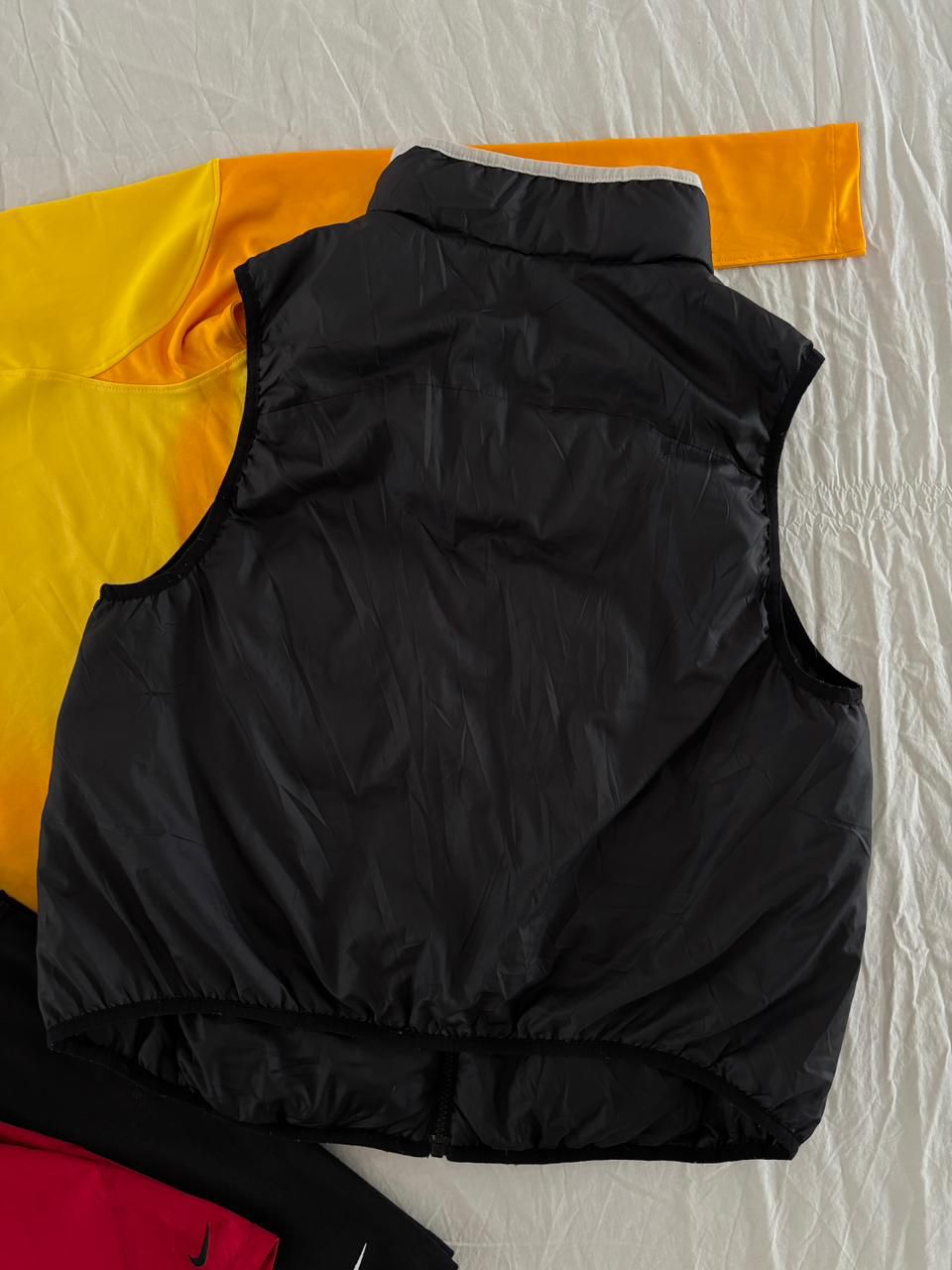 NIKE CHALECO DE PLUMA DE GANSO SIN DETALLE. MUY COMPRESIBLE. L DE DAMA.