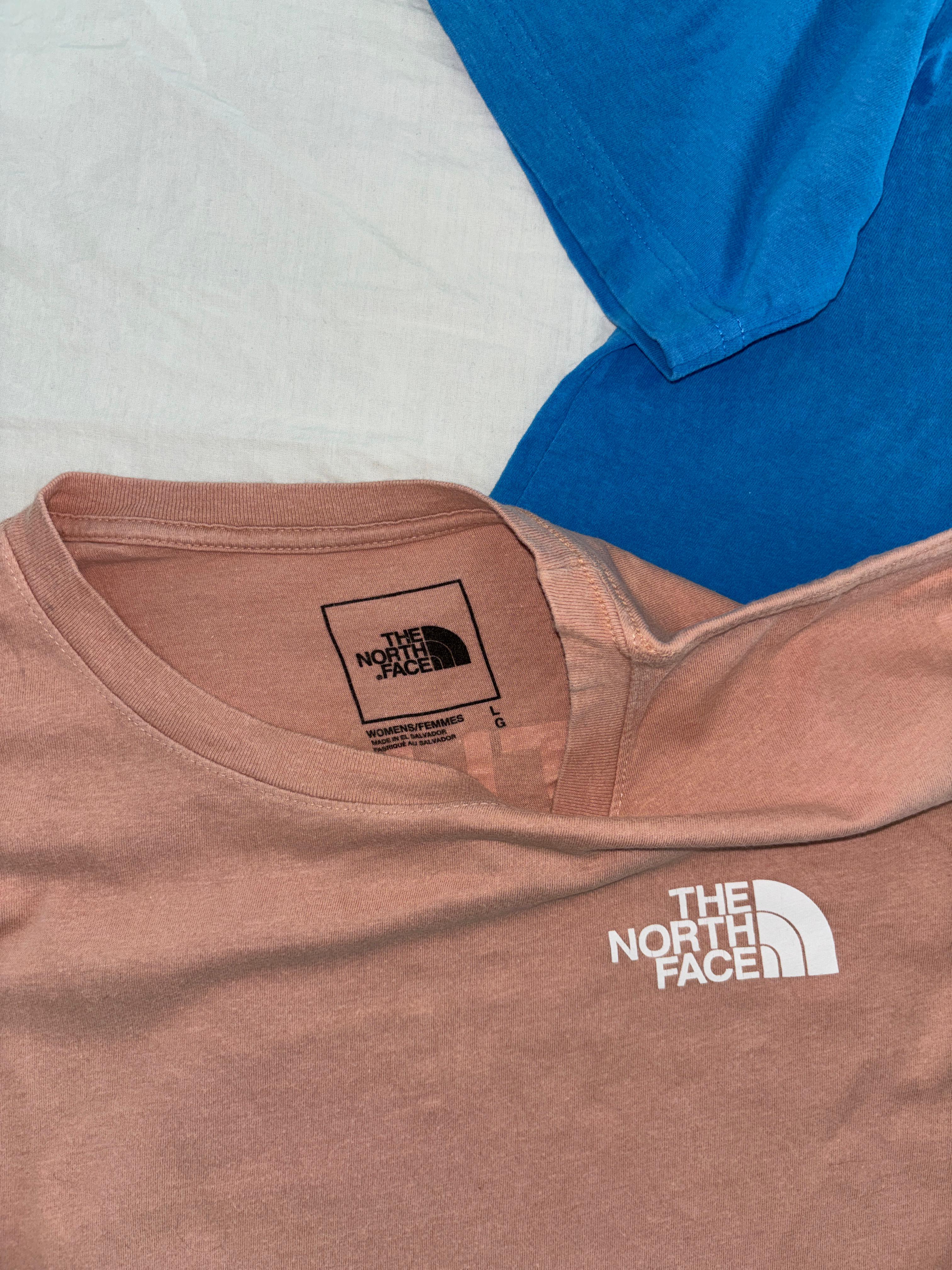 TNF ROSA TELA TIPO ALGODÓN LETRAS POCO CRAQUEADAS. L DE DAMA.