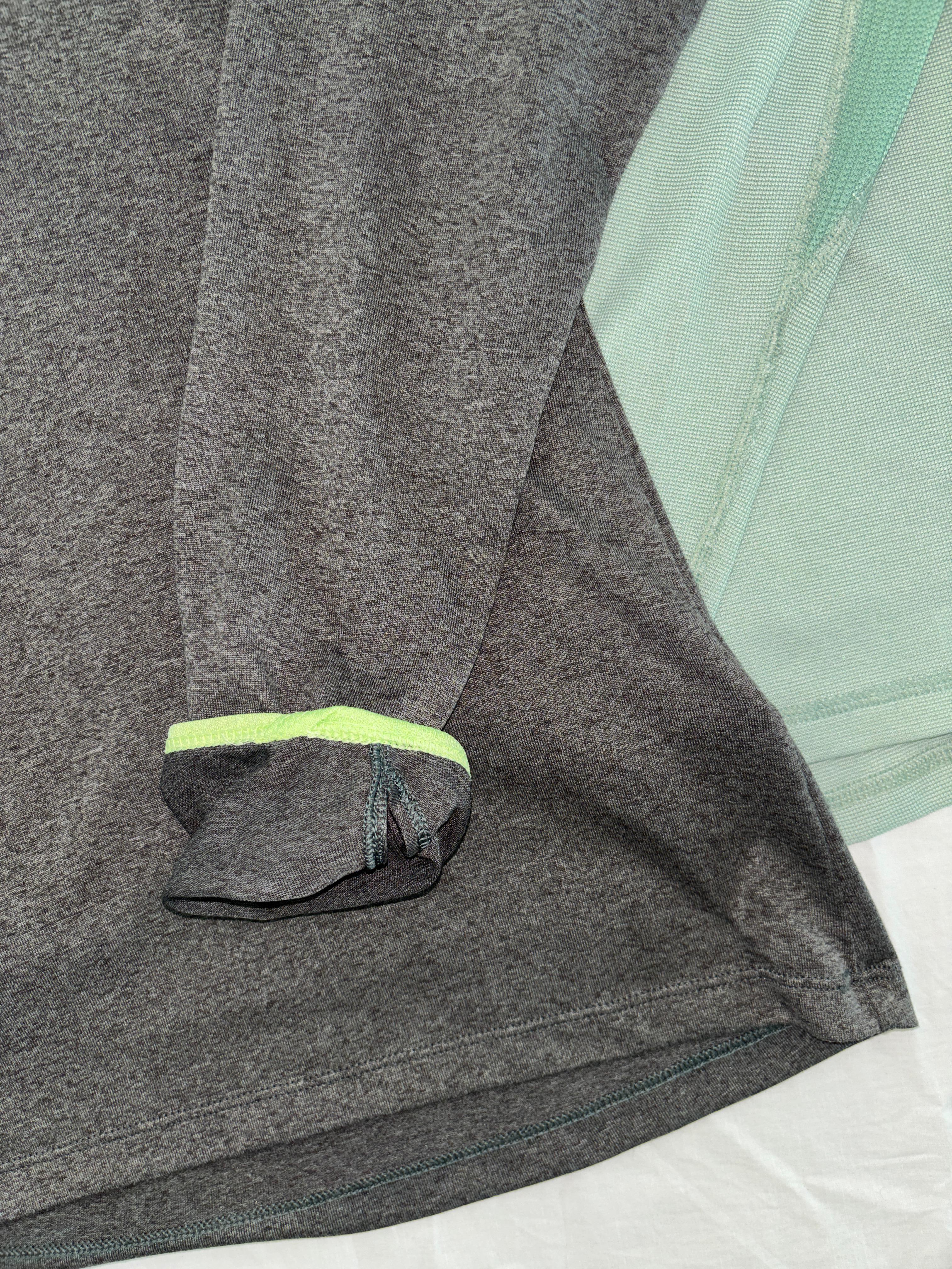 TNF GRIS CON VERDE LIGERO PARA SENDERISMO FLASH DRY (expulsa la humedad de la piel hacia la superficie para un secado rápido) SIN DETALLE. S DE DAMA.