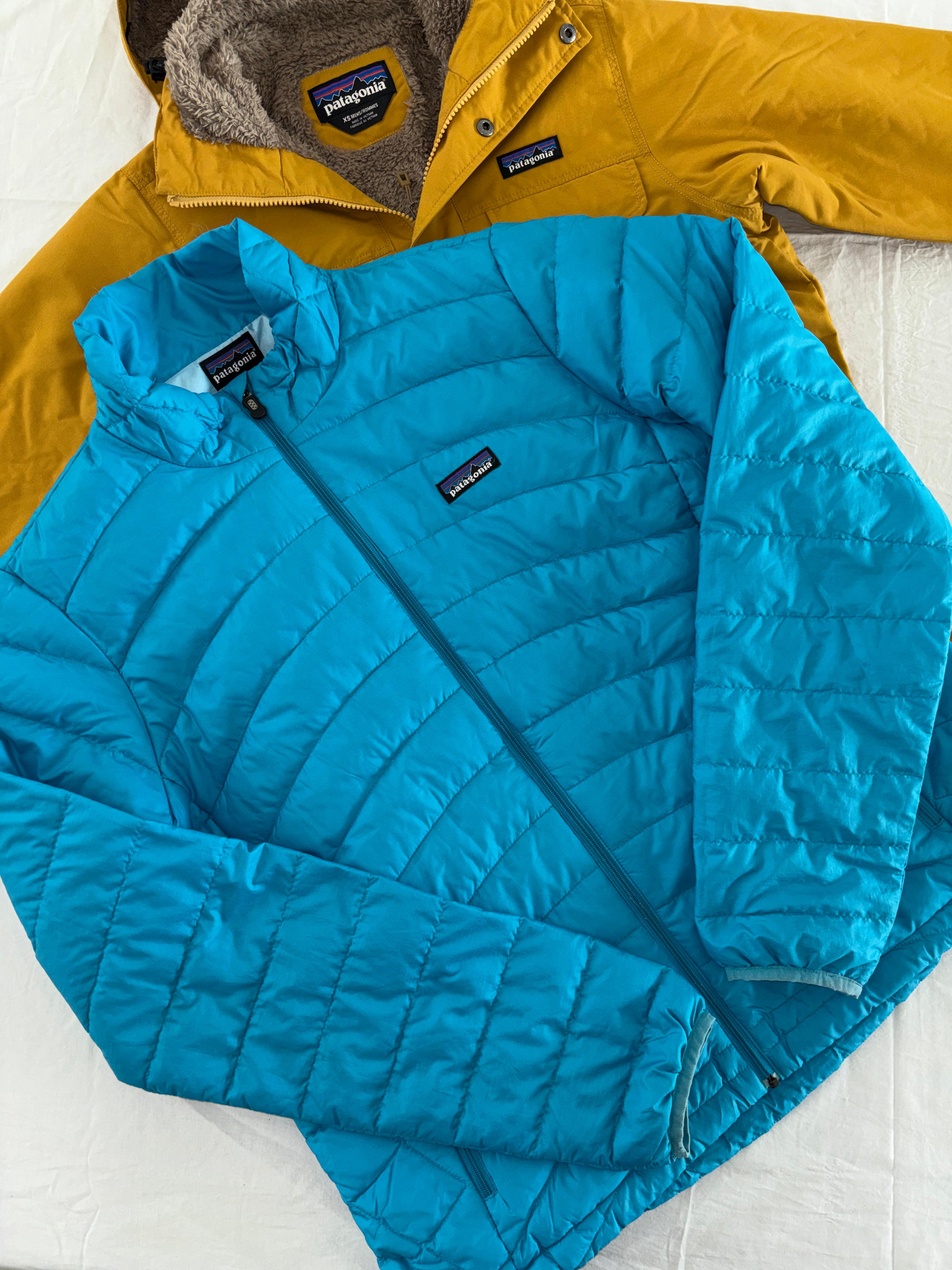 PATAGONIA DE PLUMA DE GANSO. COMPRESIBLE QUE SE HACE BOLSA. CASI COMO NUEVO. XL DE DAMA.