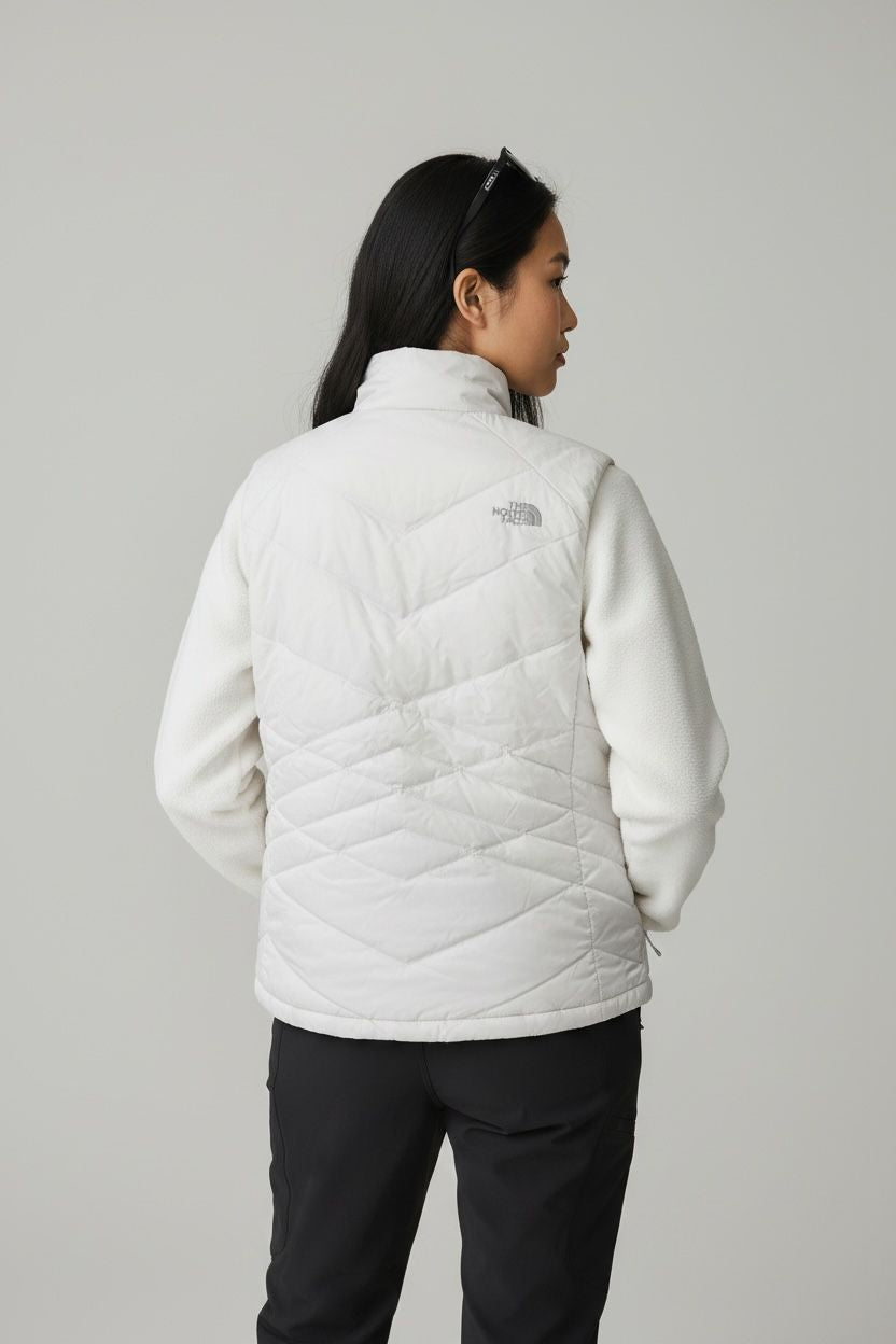 TNF CHALECO BEIGE BRILLOSO PLUMA DE 550. XL DE DAMA.