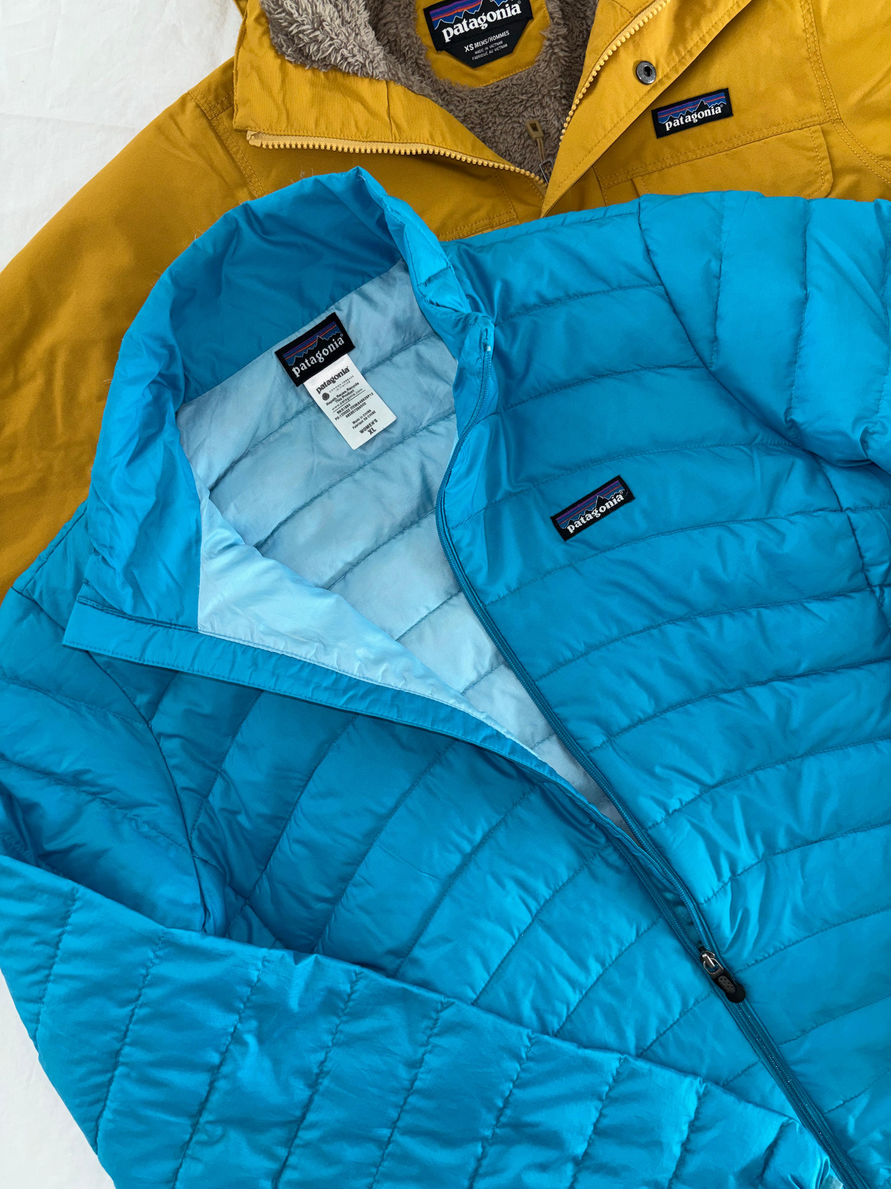 PATAGONIA DE PLUMA DE GANSO. COMPRESIBLE QUE SE HACE BOLSA. CASI COMO NUEVO. XL DE DAMA.